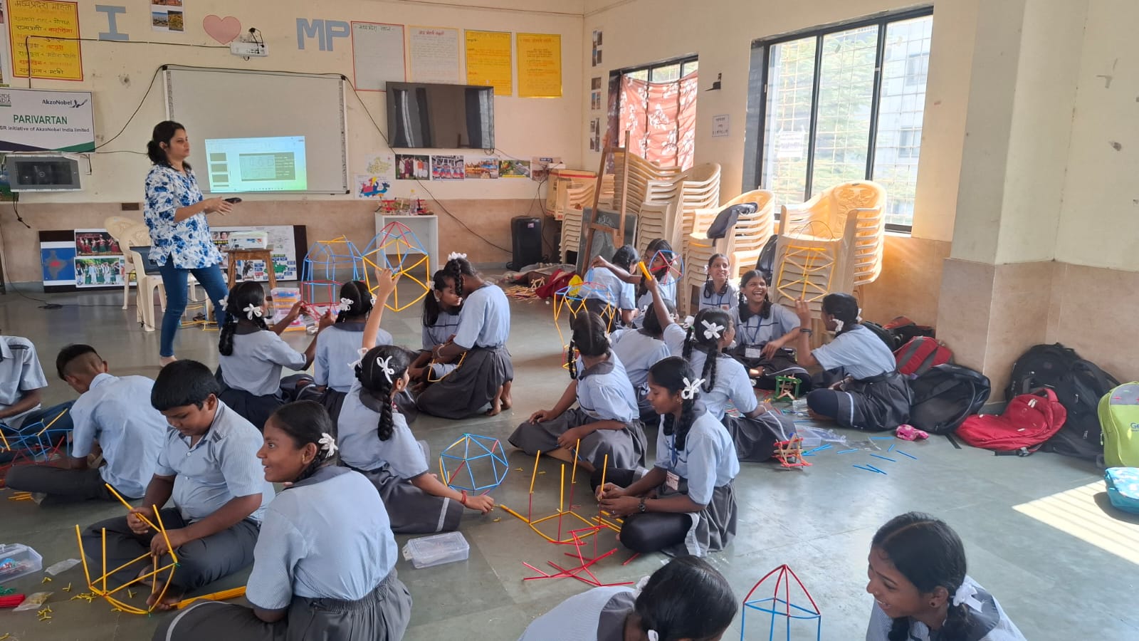 Schoolchildren working together on hands-on STEM activities